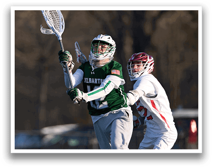 Two men playing lacrosse, one jumping in the air to catch the ball. AI generated content