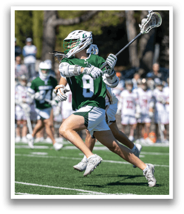 A man in a green and white uniform is running with a lacrosse stick, chasing after the ball. AI generated content