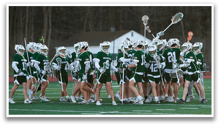 A group of people wearing green and white uniforms are standing on a field. They are holding lacrosse sticks and appear to be a lacrosse team. AI generated content