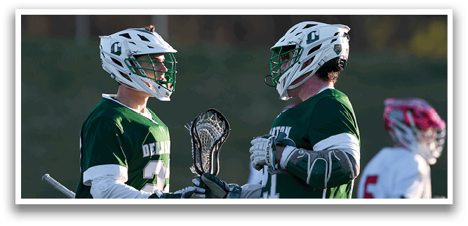Two lacrosse players from the team Delaware are talking to each other. AI generated content