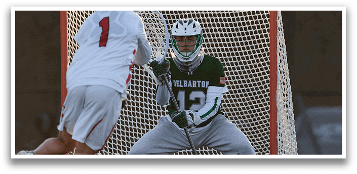 Two men playing a game of lacrosse, one is trying to score a goal while the other is trying to defend. AI generated content