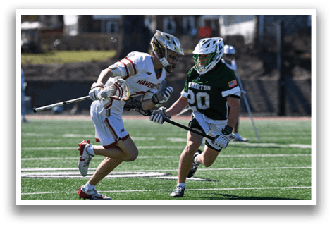 Two men are playing a game of lacrosse on a field. AI generated content