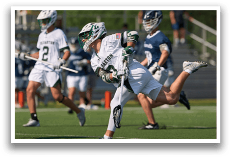 A man in a white uniform is running on a field. Description generated by AI