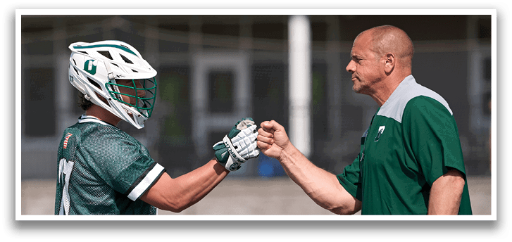 Two men shaking hands. Description generated by AI