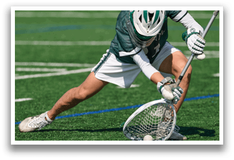 A man wearing a green and white uniform is playing baseball. Description generated by AI