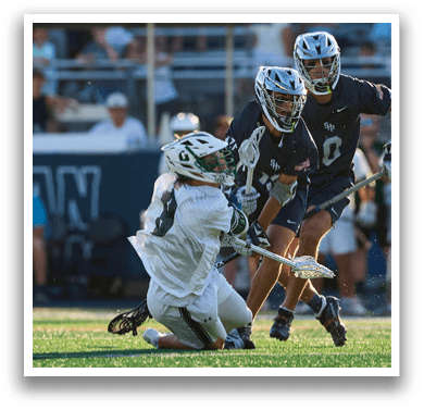 A man wearing a green and white jersey with the number 42 on it. Description generated by AI