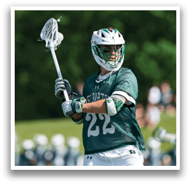 A man wearing a green and white jersey with the number 42 on it. Description generated by AI