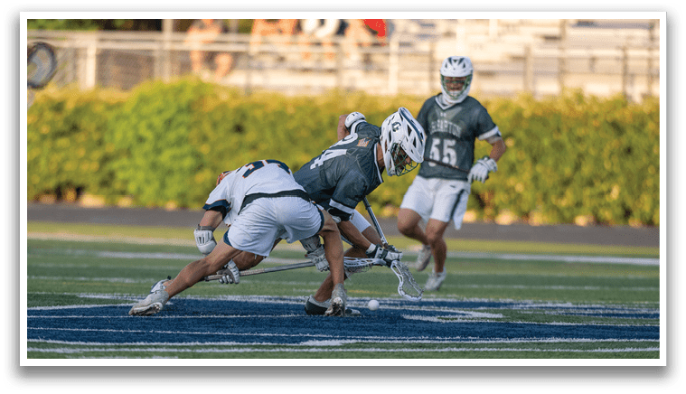 A man in a green shirt and white shorts is running with a lacrosse stick. Description generated by AI