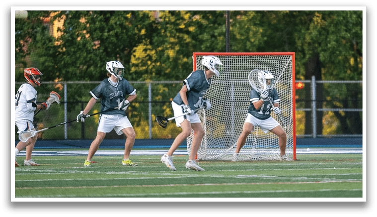 A group of men wearing green and white uniforms. Description generated by AI