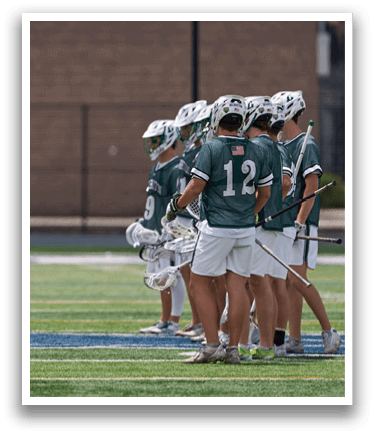 A man wearing a green and white jersey. Description generated by AI