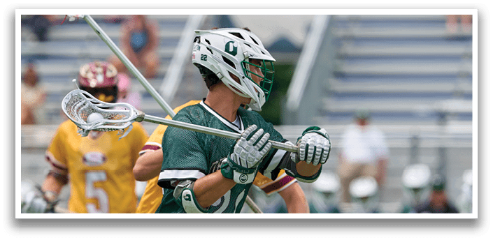 A group of people wearing green and white uniforms. Description generated by AI
