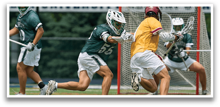 A man wearing a green and white jersey with the number 35 on it. Description generated by AI