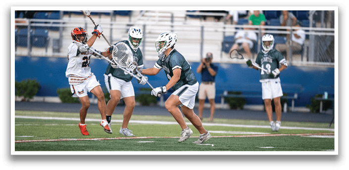A man wearing a green and white jersey is running on a field. Description generated by AI