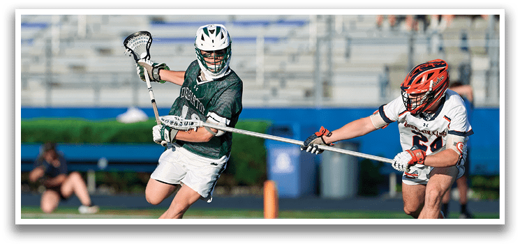 A group of young men wearing green and white uniforms. Description generated by AI