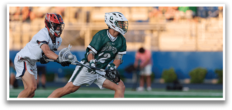 A group of young men wearing green and white uniforms. Description generated by AI