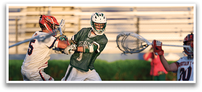 Five men wearing green jerseys with the number 11, 18, 19, 24, and 34 on them. Description generated by AI