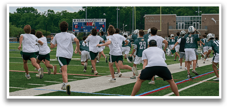 A group of young men wearing green and white uniforms. Description generated by AI