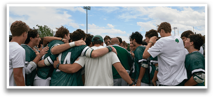 Five men wearing green jerseys with the number 11, 18, 19, 24, and 34 on them. Description generated by AI