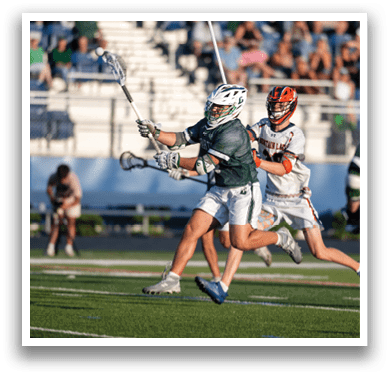 A man wearing a green and white helmet. Description generated by AI