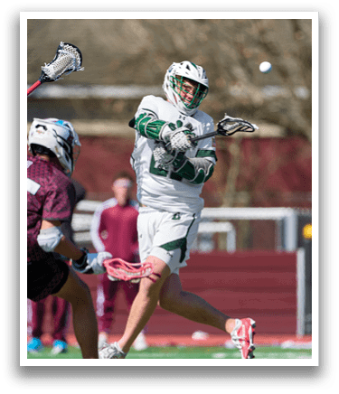 A man wearing a white and green jersey is running with a baseball bat. Description generated by AI