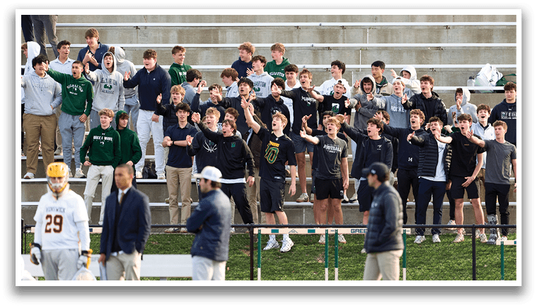 A group of people are sitting in the bleachers. Description generated by AI