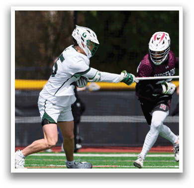 A man in a green and white uniform is running on a field. Description generated by AI