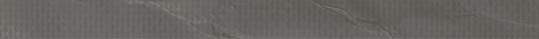 A wrinkled piece of paper with a grayish tint. Description generated by AI