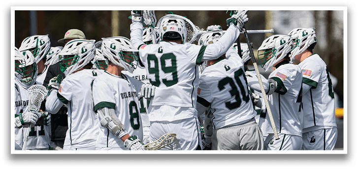 A group of people wearing white and green uniforms. Description generated by AI