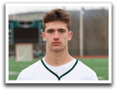A man wearing a white jersey with the number 8 on it. Description generated by AI