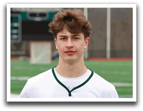 A young man wearing a white and green jersey with the number 11 on it. Description generated by AI