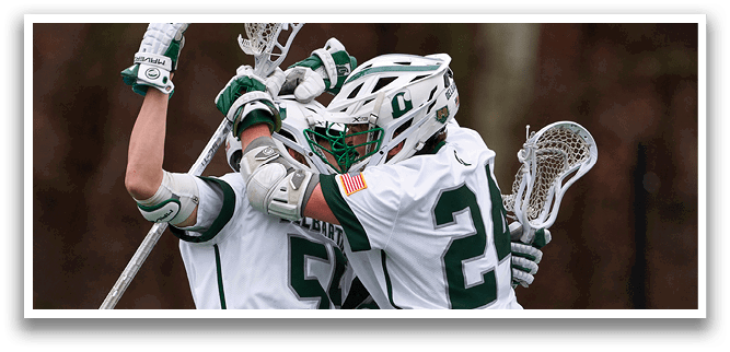 Two men wearing white and green uniforms are celebrating a victory. Description generated by AI