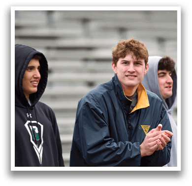 A man wearing a black jacket and a hoodie. Description generated by AI