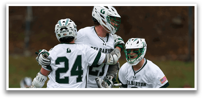 Three men wearing white and green uniforms are celebrating a victory. Description generated by AI
