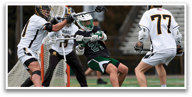 A group of men playing a game of lacrosse. Description generated by AI