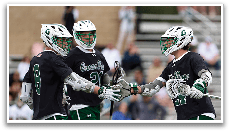 Three men wearing black and green uniforms are shaking hands. Description generated by AI