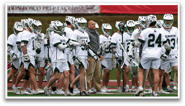 A group of people wearing white uniforms and green and white helmets. Description generated by AI