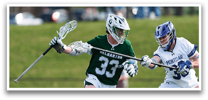 A man in a green shirt and white shorts is running with a lacrosse stick. Description generated by AI