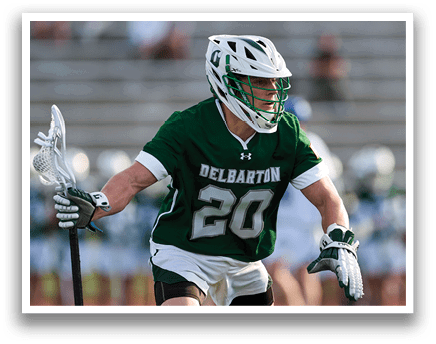 A man wearing a green and white jersey with the number 22 on it. Description generated by AI