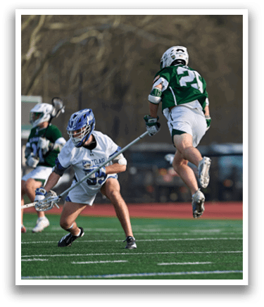 A man is jumping in the air with a hockey stick. Description generated by AI