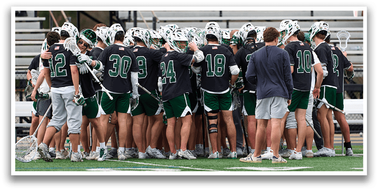 A group of people wearing green and black uniforms. Description generated by AI