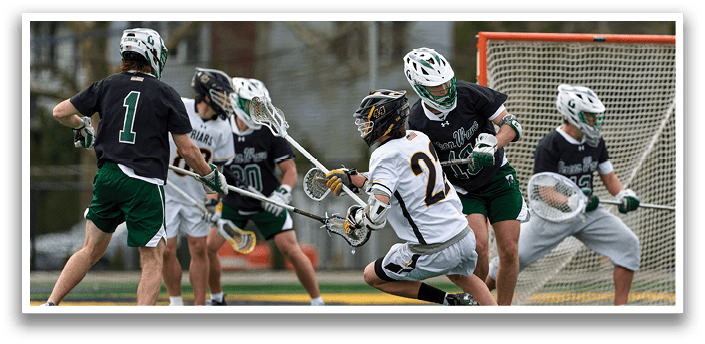 A group of people playing a game of lacrosse. Description generated by AI