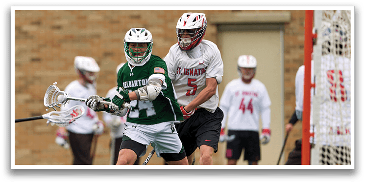 A man in a green jersey is running with a lacrosse stick. Description generated by AI