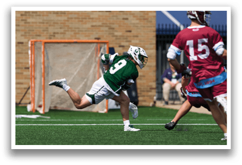 A man in a green shirt and white shorts running on a field. Description generated by AI