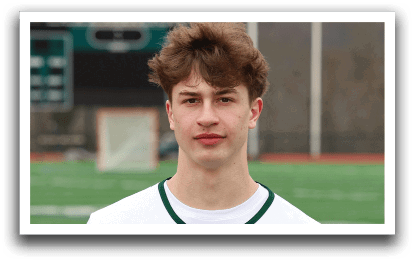 A man wearing a white and green jersey with the number 11 on it. Description generated by AI