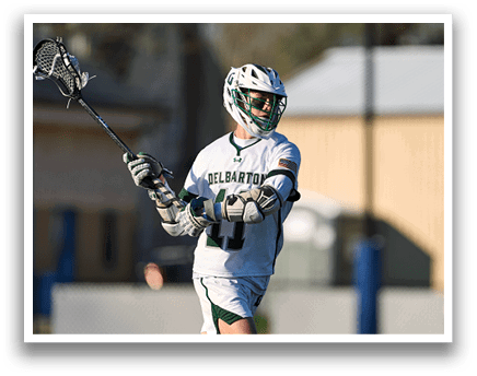 A man wearing a white jersey with the number 17 on it. Description generated by AI