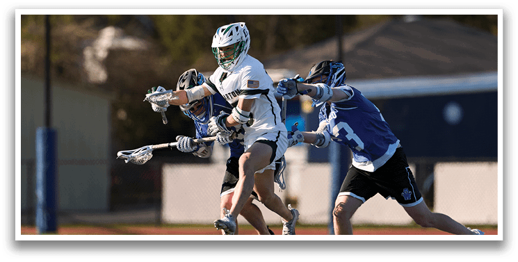 A man in a white shirt and green helmet is running with a lacrosse stick. Description generated by AI