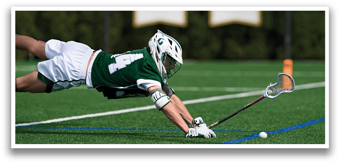 A man is diving on the ground to catch a ball. Description generated by AI