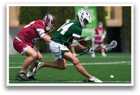 A man in a green and white uniform is running with a white ball. Description generated by AI