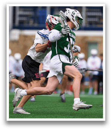 A group of people playing a game of lacrosse. Description generated by AI
