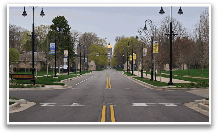 A street with a yellow line down the middle. Description generated by AI